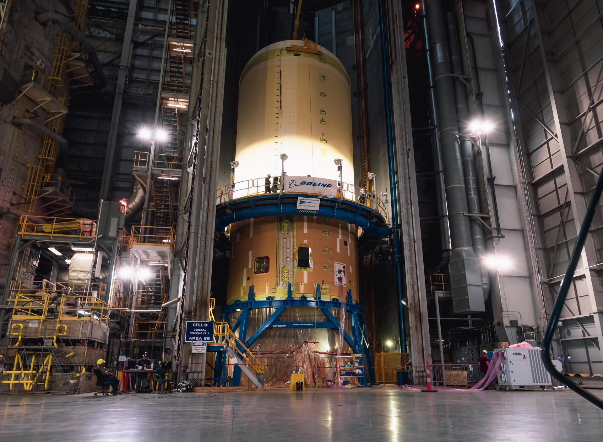 The liquid oxygen tank for NASA’s SLS (Space Launch System) rocket core stage for the Artemis III mission is lifted into a production cell at the agency’s Michoud Assembly Facility in New Orleans on Nov. 7. Move crews use an overhead crane system to lift the tank from the mobile transporter, which carried it from another area of the factory and set it atop the previously loaded intertank. Once the liquid oxygen tank is mated to the intertank, team will mate the stage’s forward skirt atop the tank to complete the forward join.   The propellant tank is one of five major elements that make up the 212-foot-tall rocket stage. The core stage, along with its four RS-25 engines, produce more than two million pounds of thrust to help launch NASA’s Orion spacecraft, astronauts, and supplies beyond Earth’s orbit and to the lunar surface for Artemis.